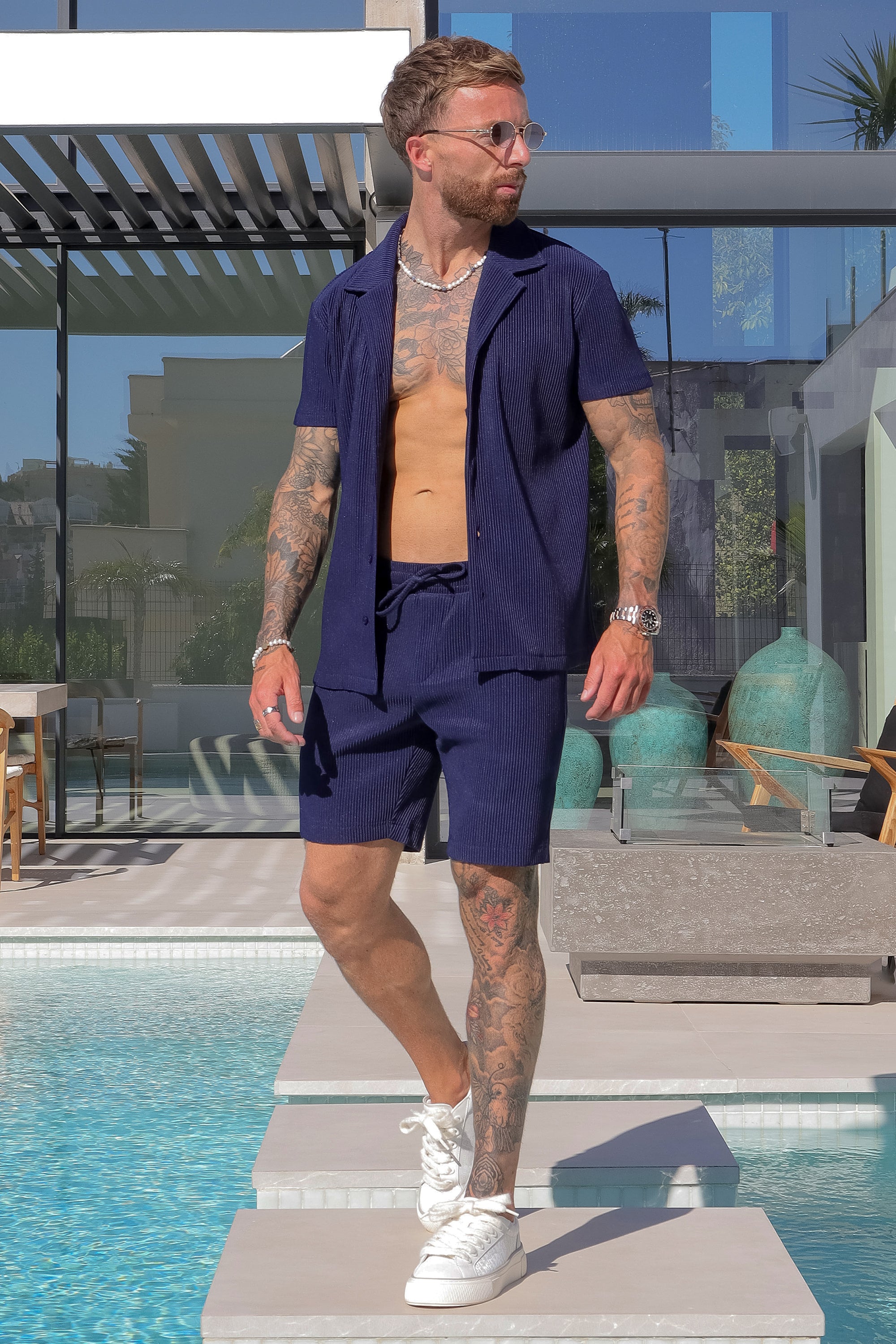 THE SLIM PLEATED SHORTS - NAVY BLUE